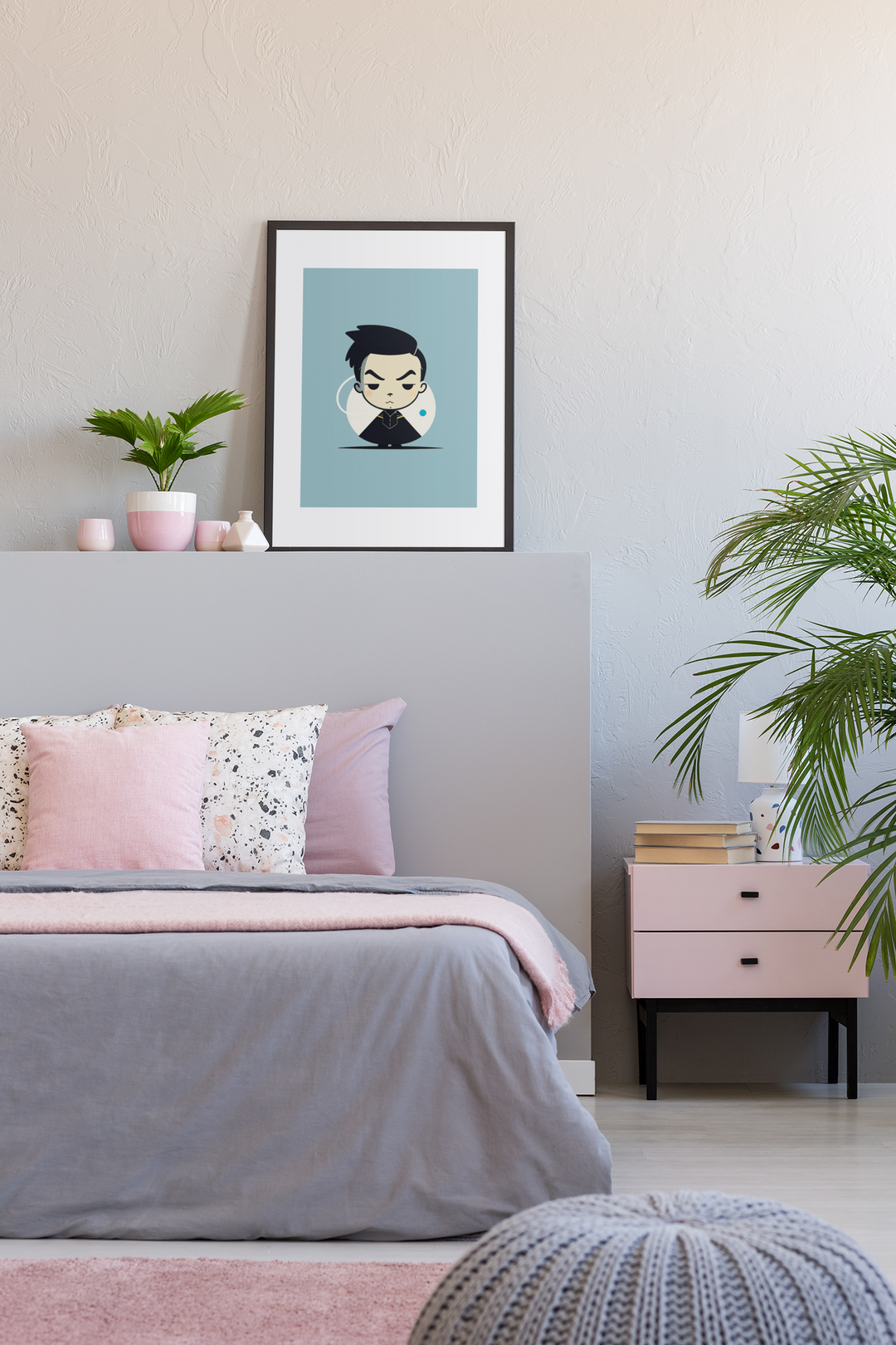 Modern bedroom with gray bed, pink nightstand, and framed artwork on wall.