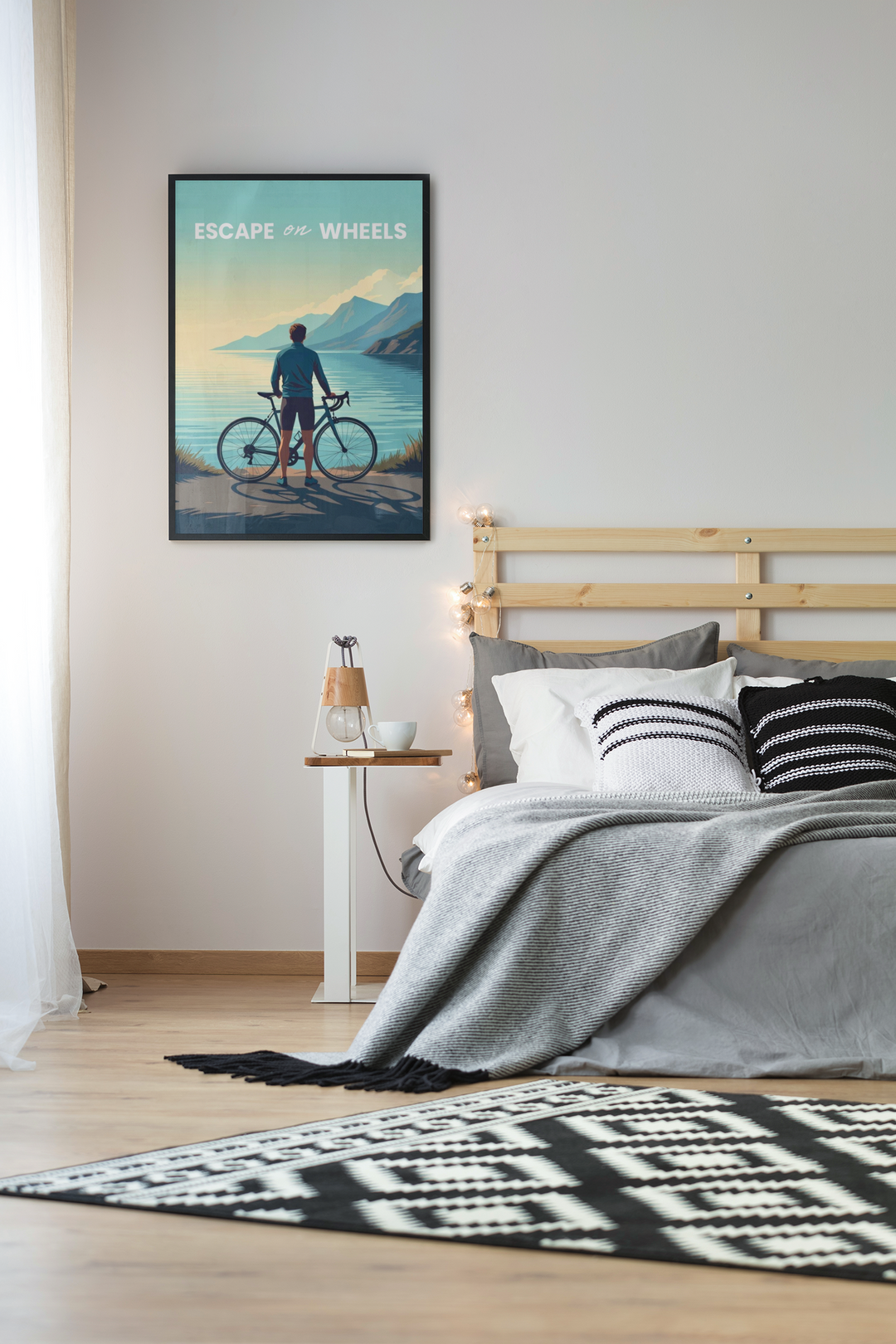 Bedroom with a bicycle-themed wall art print above the bed.
