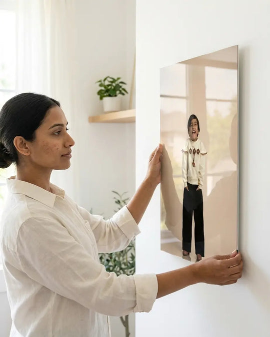 Printlagoon personalized acrylic wall art being mounted on a wall, featuring premium HD photo printing, glossy acrylic finish, frameless design, and elegant custom decor for homes, offices, and thoughtful gifts.