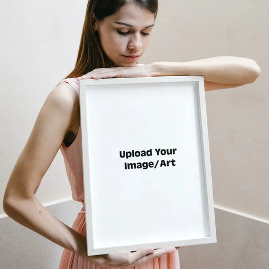 Printlagoon personalized white framed wall art mockup held by a woman, custom photo frame for home decor and gifting.