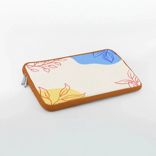 Custom laptop sleeve with abstract red leaf print and brown  trim