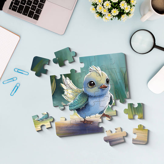 Tiny bird jigsaw puzzle on desk mockup with laptop, coffee cup, notebook, and scattered puzzle pieces by printlagoon
